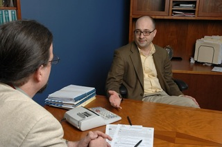 Jeffrey Schultz, CPA who is a small business CPA advising a business owner. 
