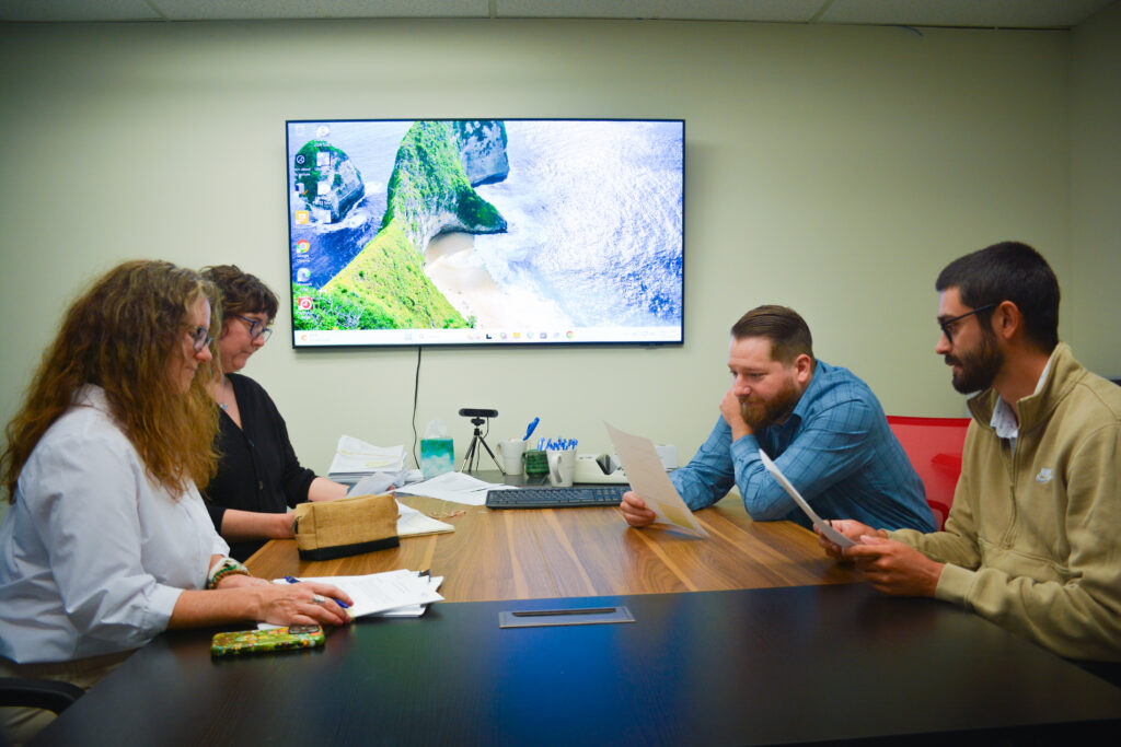 Jason Lira leading a Dental CPA team Meeting with Eddie White, Abbie Schultz and Lori Villar