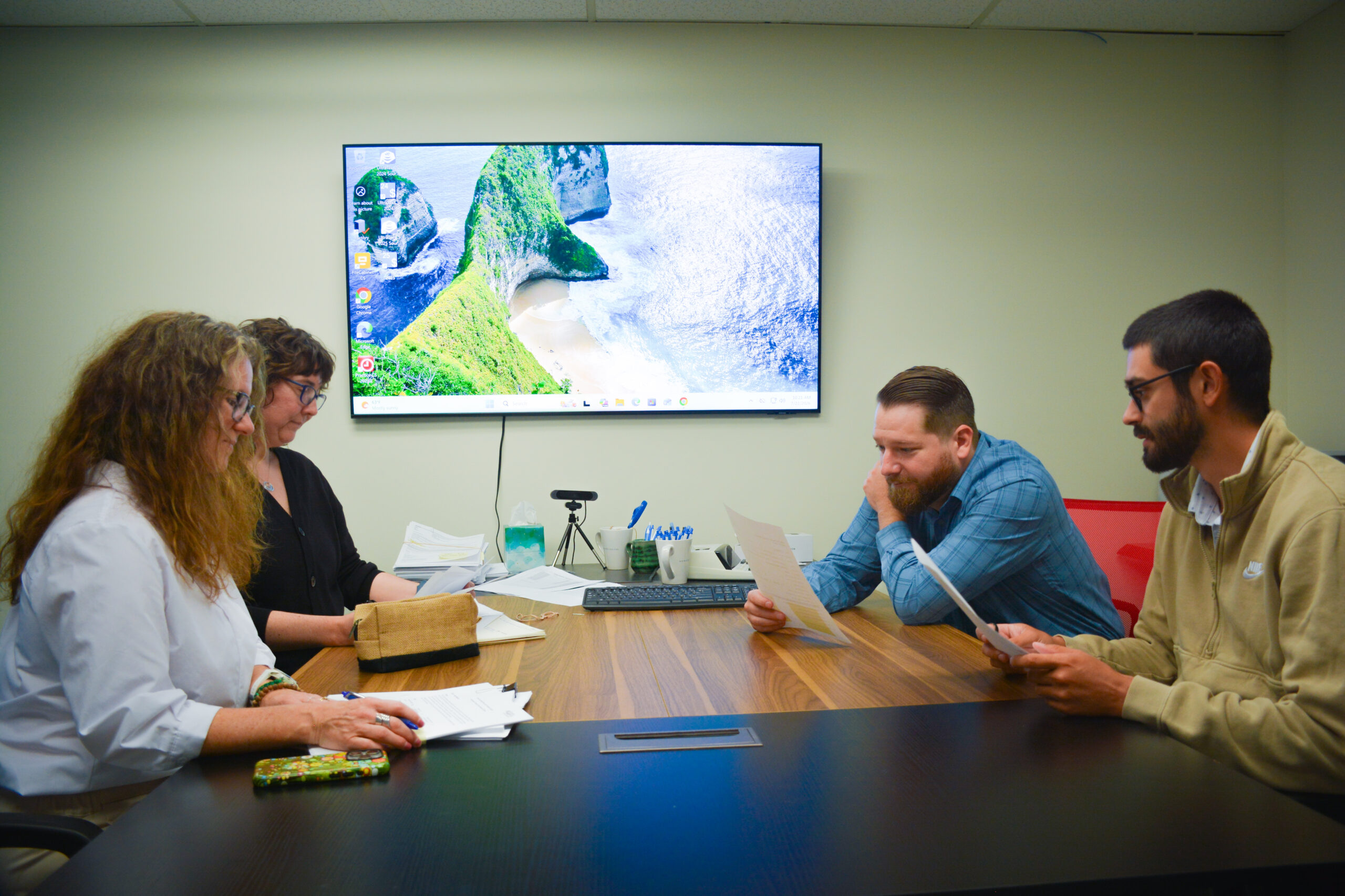 Jason Lira leading a Dental CPA team Meeting with Eddie White, Abbie Schultz and Lori Villar